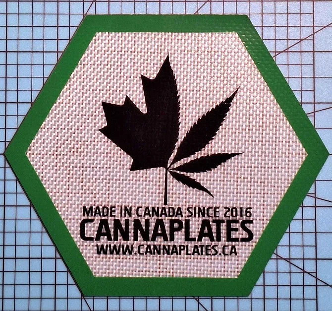 Hexagonal sticker with a black cannabis leaf and text 'MADE IN CANADA SINCE 2016 CANNAPLATES'