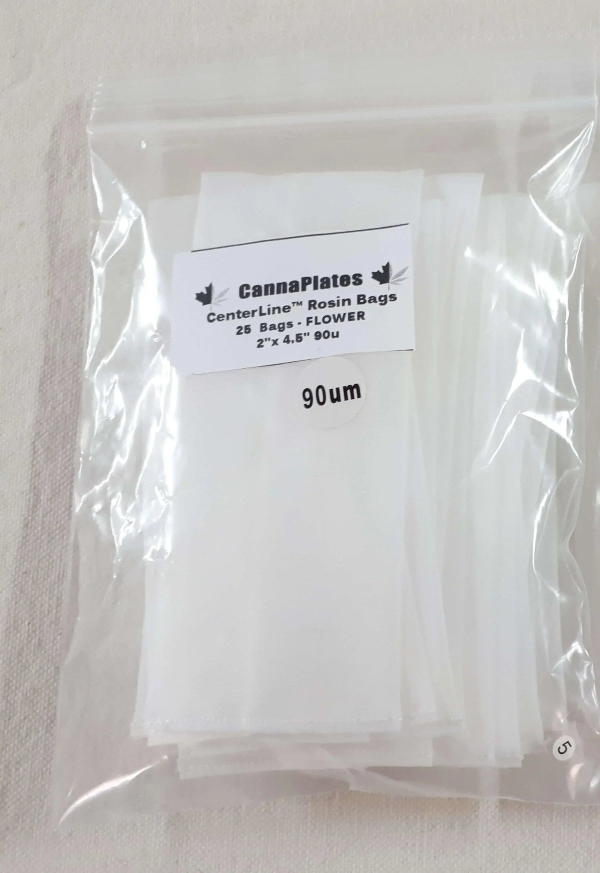 CannaPlates CenterLine 90u Rosin Bags for flower in a clear plastic storage pouch