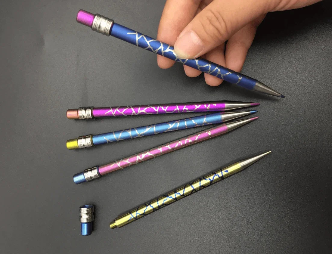 A collection of colorful patterned mechanical pencils in various shades of blue, purple, and gold.