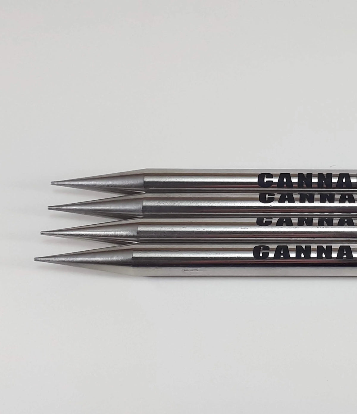 Four pointed metal tools with CANNA branding on a white background.