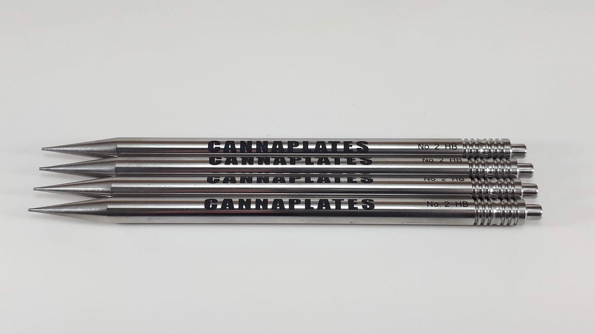 Four CannaPlates branded metal tools with pointed tips and knurled handles on a white background.
