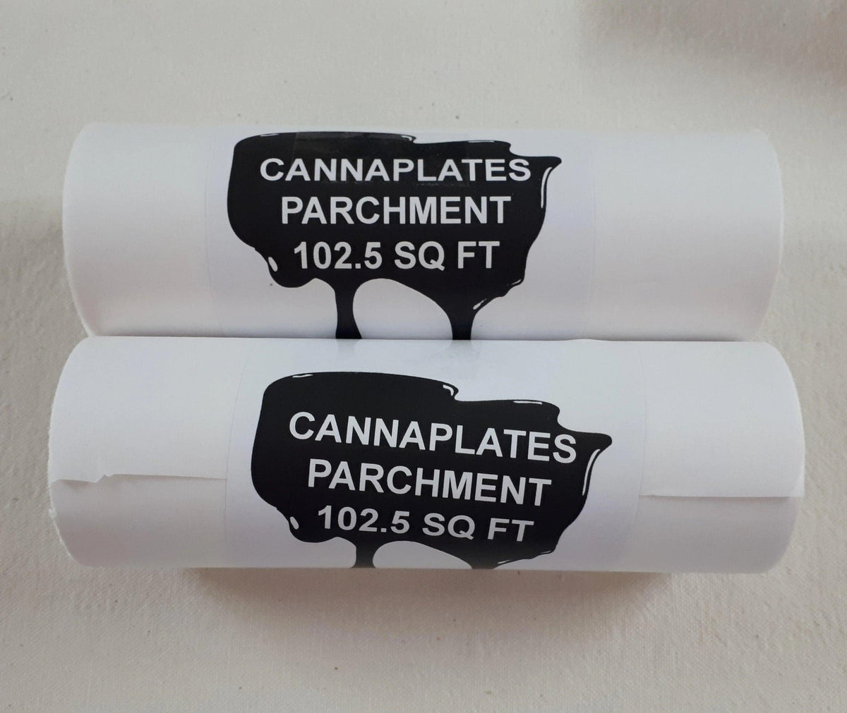 Two rolls of CannaPlates parchment paper, 102.5 sq ft each.